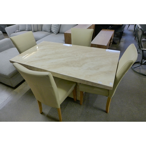 1446 - A cream marble effect dining table with a set of four cream leather dining chairs