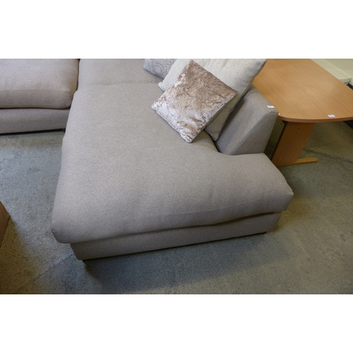 1539 - A biscuit upholstered corner sofa