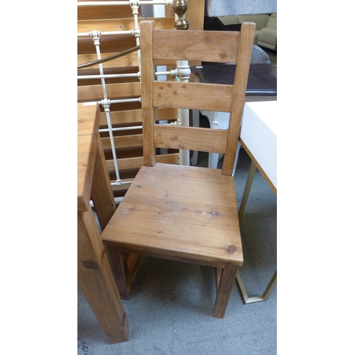 1564 - A small pine table and two chairs