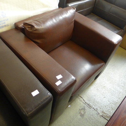 1591 - A brown leather effect armchair