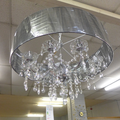 1458 - A chrome eight arm chandelier with black shade