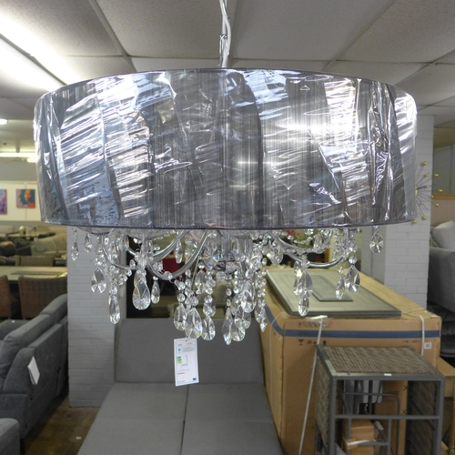 1458 - A chrome eight arm chandelier with black shade