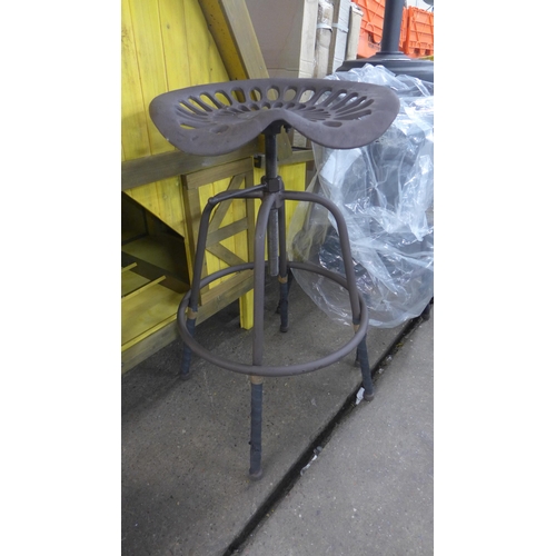 2249 - A tractor seat bar stool * This lot is subject to VAT