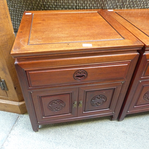 1570 - An oriental mahogany two door, single drawer cabinet