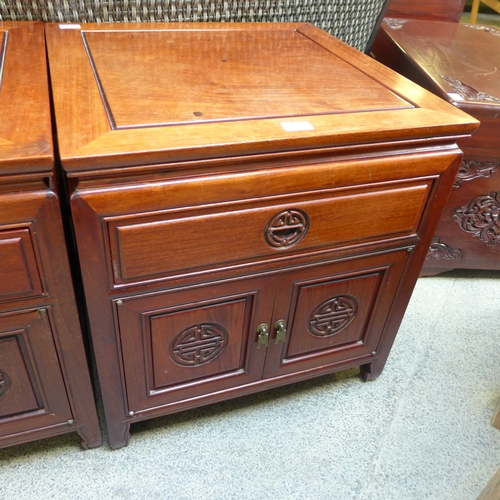 1571 - An oriental mahogany two door, single drawer cabinet