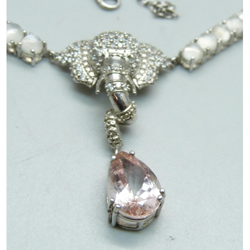 1022 - A silver gem set elephant necklace