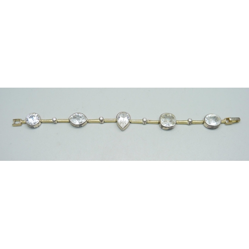 1023 - A silver gem set bracelet, 27.9g