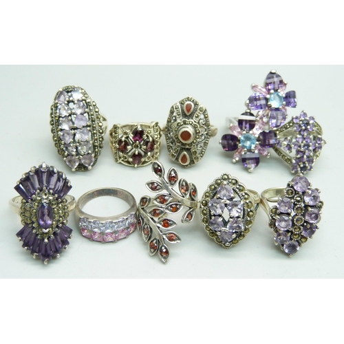 1031 - Ten silver 'chunky' rings, six amethyst set