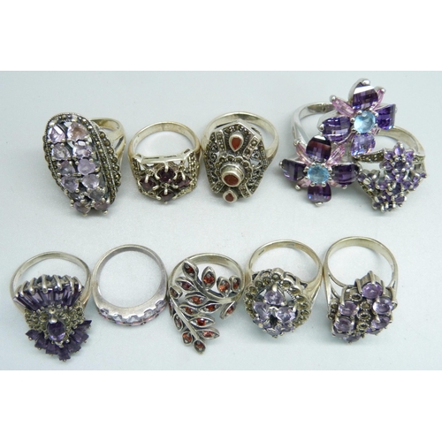 1031 - Ten silver 'chunky' rings, six amethyst set