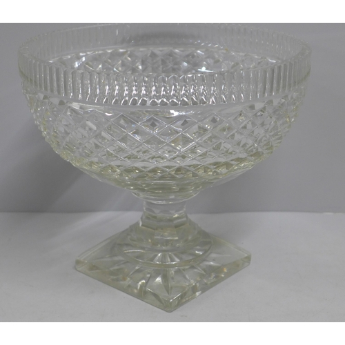 1045 - A heavy cut glass footed bowl, chip to one corner of the foot **PLEASE NOTE THIS LOT IS NOT ELIGIBLE... 