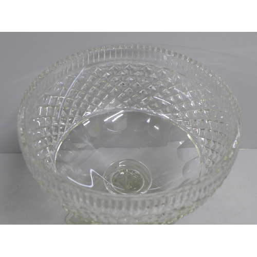 1045 - A heavy cut glass footed bowl, chip to one corner of the foot **PLEASE NOTE THIS LOT IS NOT ELIGIBLE... 