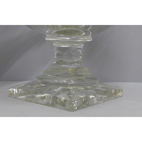 1045 - A heavy cut glass footed bowl, chip to one corner of the foot **PLEASE NOTE THIS LOT IS NOT ELIGIBLE... 