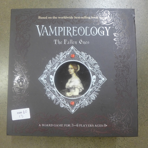 1046 - A Vampireology The Fallen Ones board game and a mounted skull