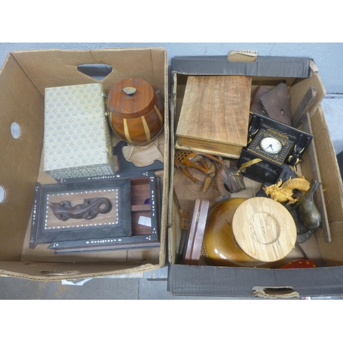 1067 - Two boxes of assorted treen including an Indian box, biscuit barrel, animal figures, an Egyptian rev... 