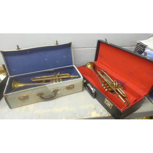 1069 - Two trumpets, cased