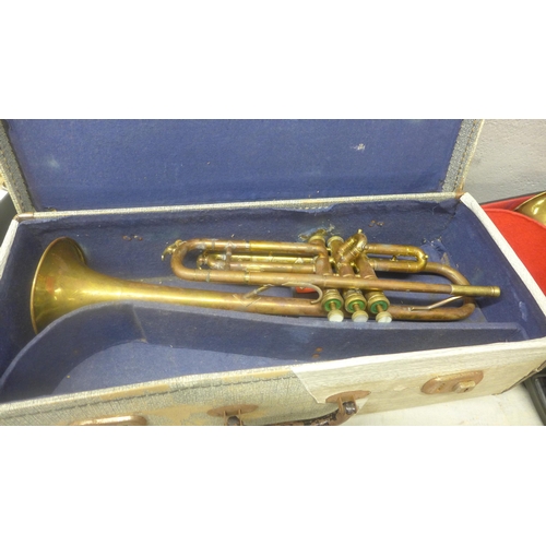 1069 - Two trumpets, cased