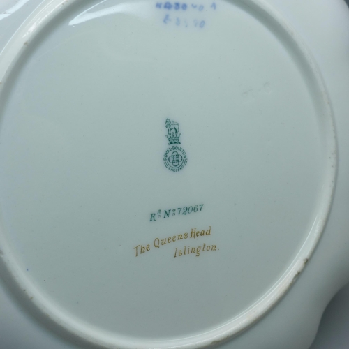 604 - A Royal Doulton hand painted cabinet plate, The Queens Head, Islington, signed C. Holloway