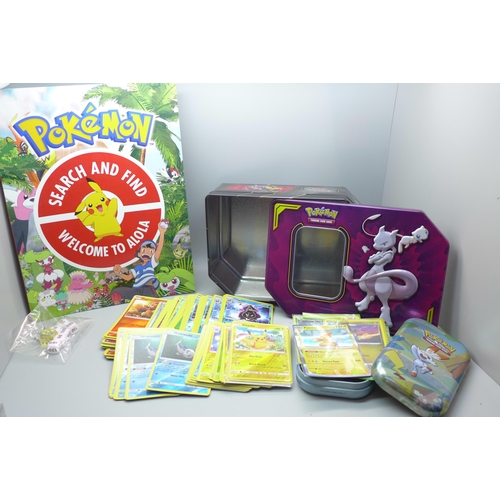 622 - 120 Reverse Holo and Holo Pokemon cards in collectors tin with Pokemon book