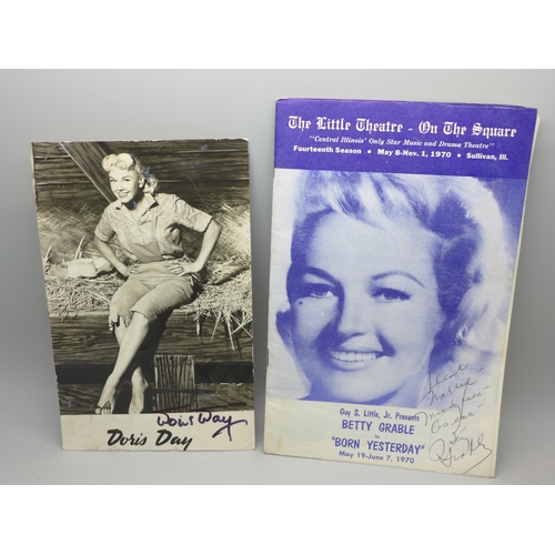 629 - A Betty Grable autographed magazine, 1970 and an autographed black and white photograph of Doris Day