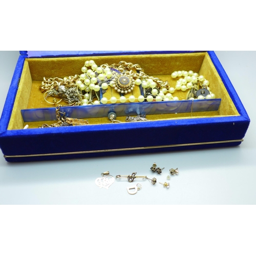 642 - A box of costume jewellery including 3.5g of 9ct gold