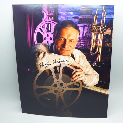 643 - A Hugh Hefner signed photo