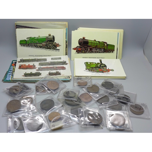 646 - A collection of thirty coins and tokens including 19th Century and eighty-five locomotives postcards