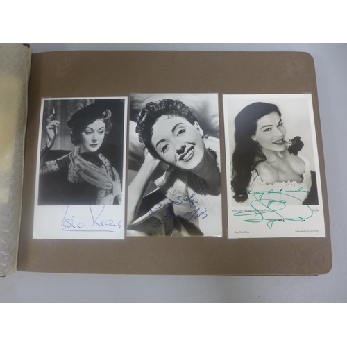 656 - Two albums of 1940s and 1950s movie star and celebrity signed photographs, real and facsimile, one a... 