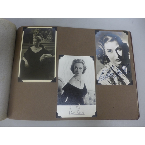 656 - Two albums of 1940s and 1950s movie star and celebrity signed photographs, real and facsimile, one a... 