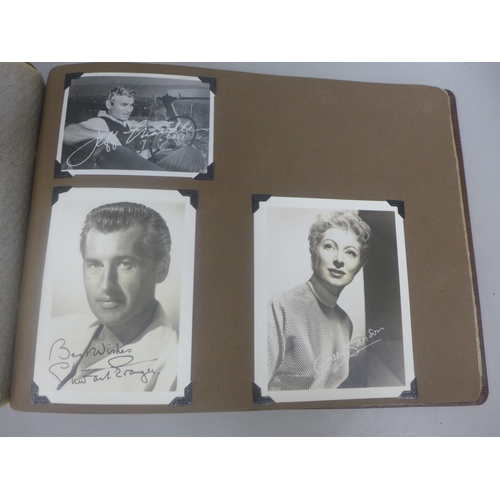 656 - Two albums of 1940s and 1950s movie star and celebrity signed photographs, real and facsimile, one a... 