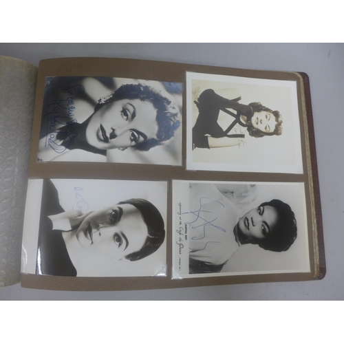 656 - Two albums of 1940s and 1950s movie star and celebrity signed photographs, real and facsimile, one a... 