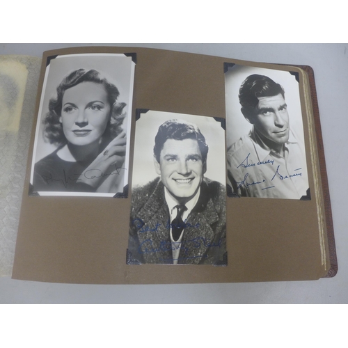 656 - Two albums of 1940s and 1950s movie star and celebrity signed photographs, real and facsimile, one a... 