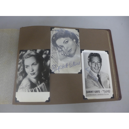 656 - Two albums of 1940s and 1950s movie star and celebrity signed photographs, real and facsimile, one a... 