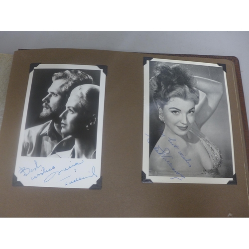 656 - Two albums of 1940s and 1950s movie star and celebrity signed photographs, real and facsimile, one a... 