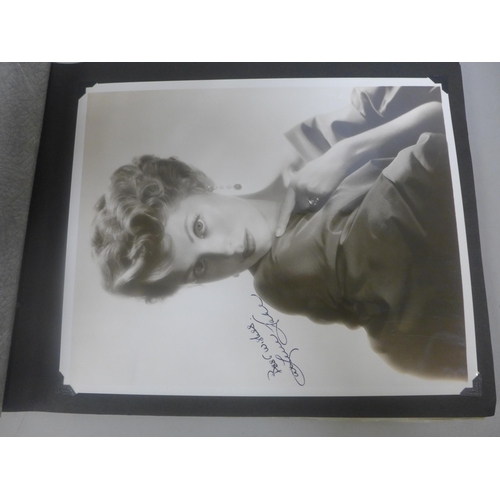 656 - Two albums of 1940s and 1950s movie star and celebrity signed photographs, real and facsimile, one a... 