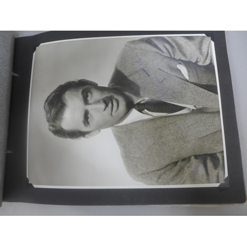 656 - Two albums of 1940s and 1950s movie star and celebrity signed photographs, real and facsimile, one a... 