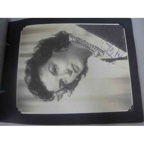 656 - Two albums of 1940s and 1950s movie star and celebrity signed photographs, real and facsimile, one a... 