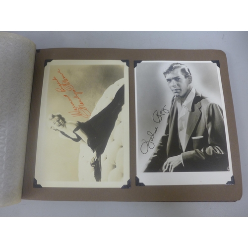 656 - Two albums of 1940s and 1950s movie star and celebrity signed photographs, real and facsimile, one a... 