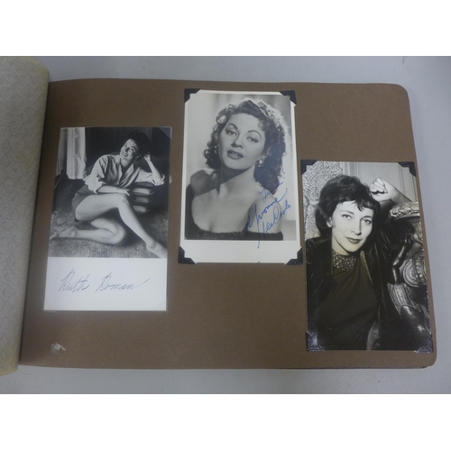 656 - Two albums of 1940s and 1950s movie star and celebrity signed photographs, real and facsimile, one a... 