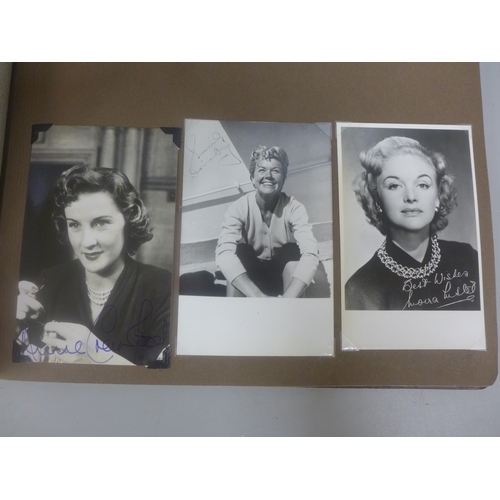 656 - Two albums of 1940s and 1950s movie star and celebrity signed photographs, real and facsimile, one a... 