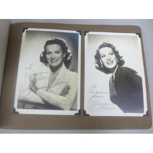 656 - Two albums of 1940s and 1950s movie star and celebrity signed photographs, real and facsimile, one a... 