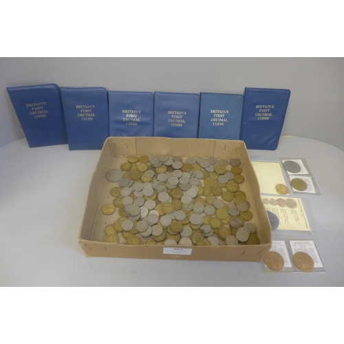 663 - A collection of three penny and six pences, decimal coin sets and some replicas of early coins