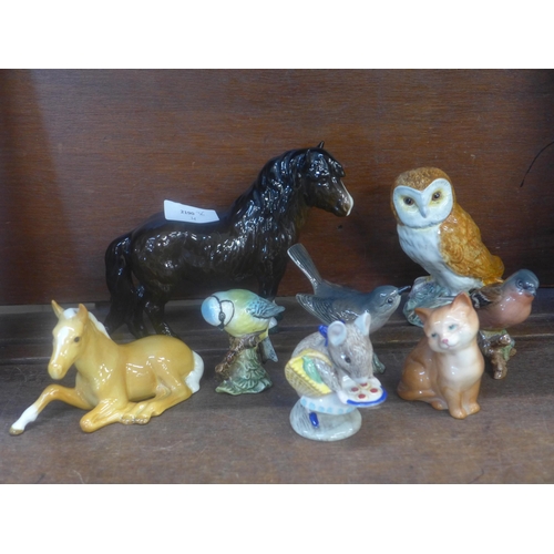 669 - A collection of Beswick figures, horses and birds, small chip to blue tit tail feathers