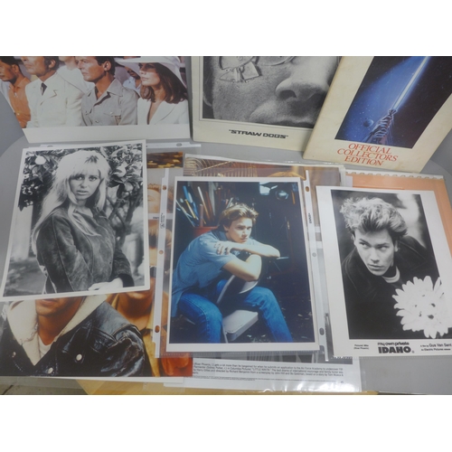 677 - Film memorabilia; lobby cards, James Bond, Straw Dogs, a Girls Town Promo book, Home Alone, River Ph... 