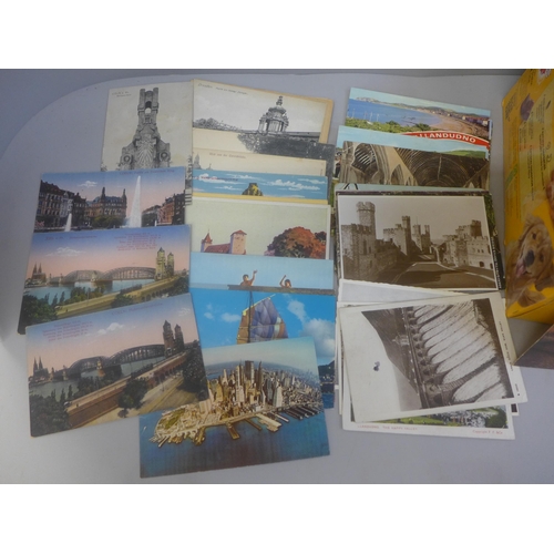 688 - A box of vintage to modern postcards