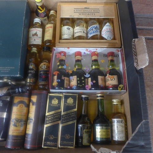 697 - A box of whisky miniatures including box sets and individually boxed; Glenmorangie, Pig's Nose, Whit... 