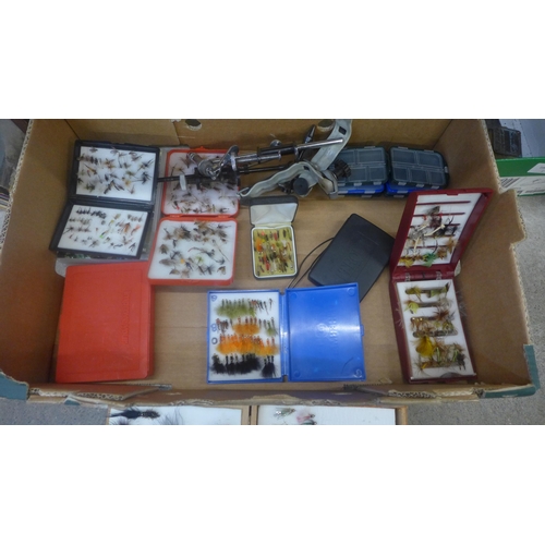 717 - A box of fishing flies, rod clips, fly tying vices, etc.