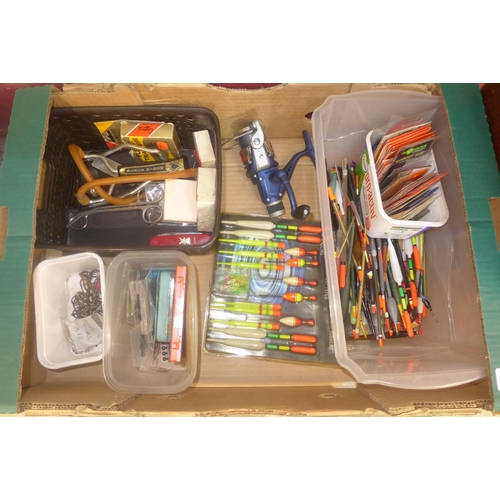 723 - A box of coarse fishing floats, hooks, reel and accessories