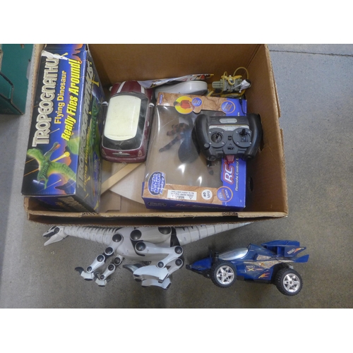 724 - A Robotics Roboreptile dinosaur with remote control, a Tropeognathu flying dinosaur, boxed, a remote... 