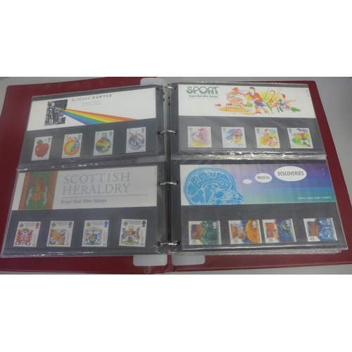 738 - GB presentation packs of stamps in an album (44)