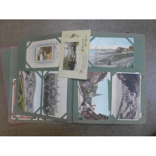 749 - An album of 330 Edwardian and later postcards, about half of which are saucy seaside humour